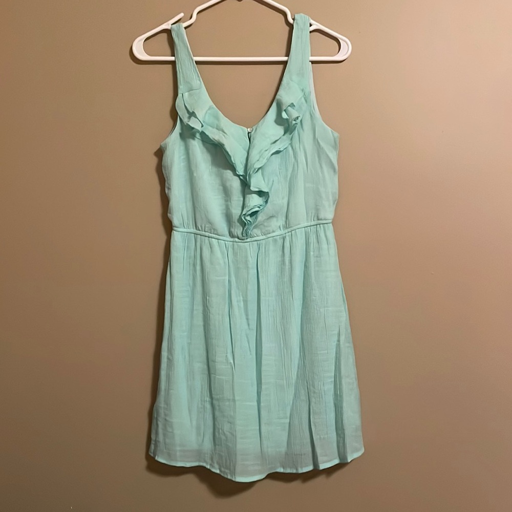 Mint green dress. Ruffle front. Size small
